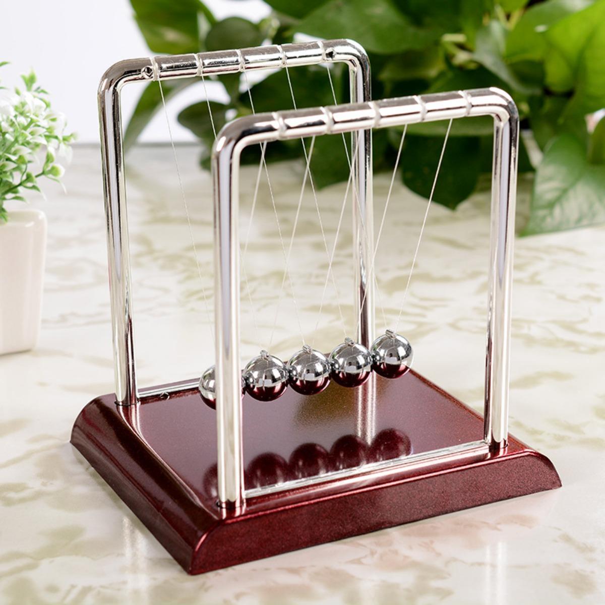 Newton's Cradle: An Intriguing Educational Science Toy for Kids, Exploring the Wonders of Physics Through a Metal Balance Ball Antistress Game