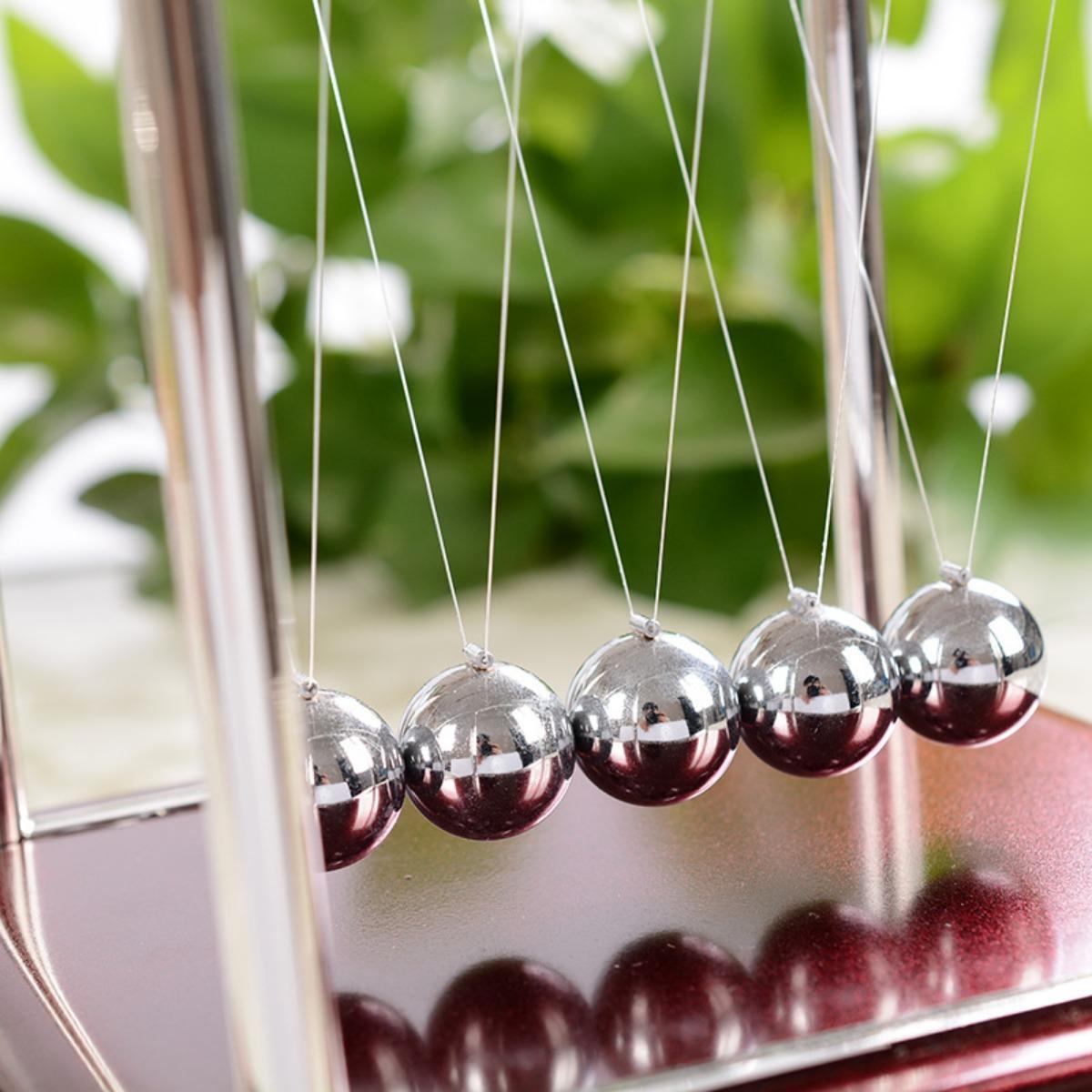 Newton's Cradle: An Intriguing Educational Science Toy for Kids, Exploring the Wonders of Physics Through a Metal Balance Ball Antistress Game