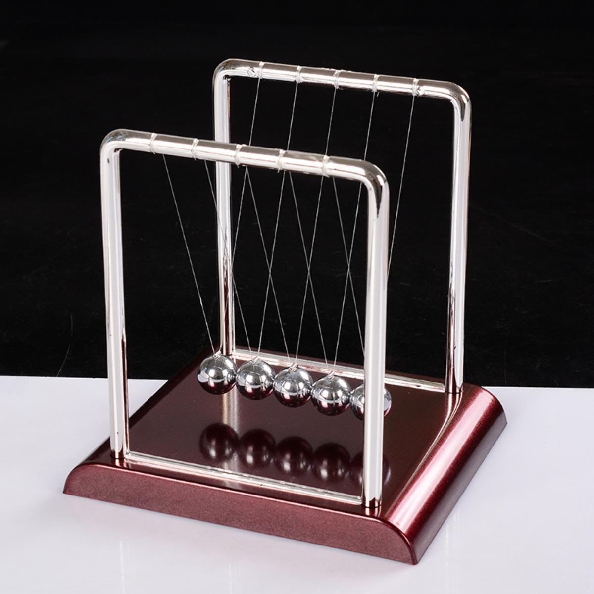 Newton's Cradle: An Intriguing Educational Science Toy for Kids, Exploring the Wonders of Physics Through a Metal Balance Ball Antistress Game